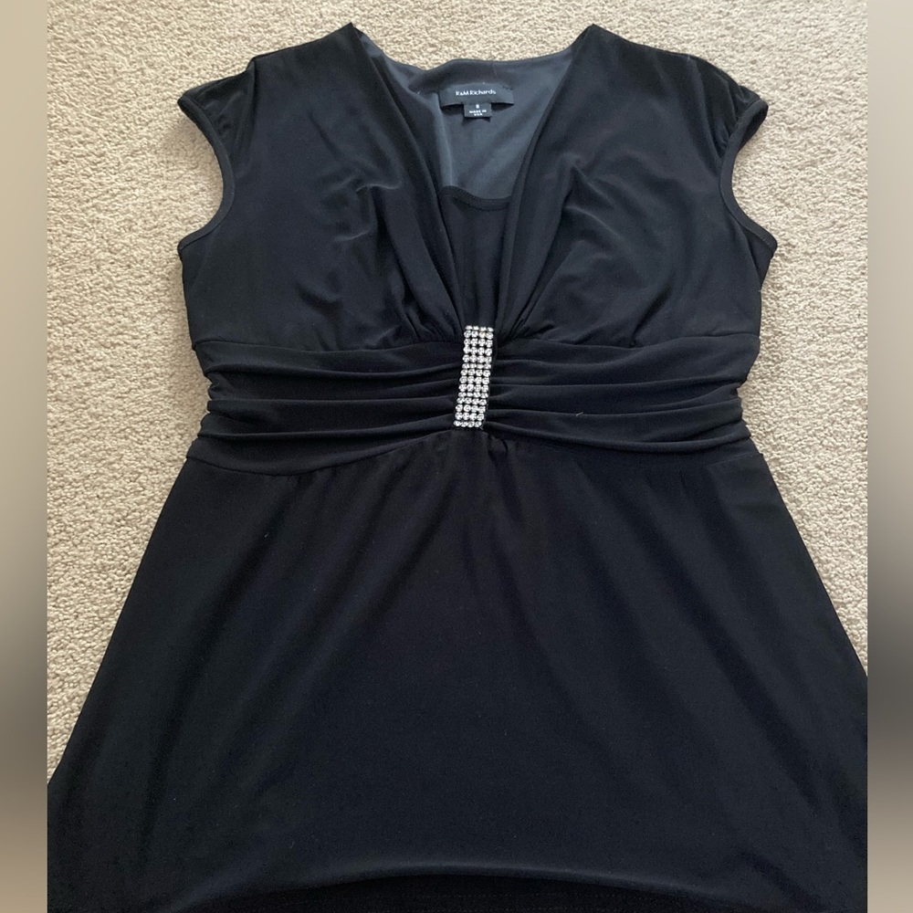 Beautiful black blouse with rhinestone detail